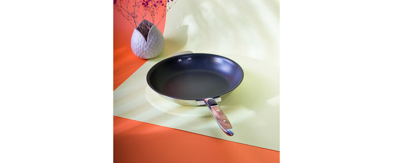 I scratched the Exceliss® non-stick coating on my Cristel frying pan. Does it present a health risk?