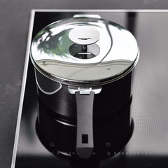 HOW CAN I REMOVE BURN STAINS FROM AN INDUCTION HOT PLATE?