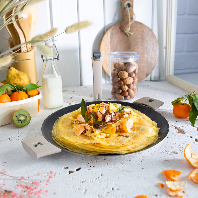 Crepe nests with chocolate, clementine, mango and kiwi